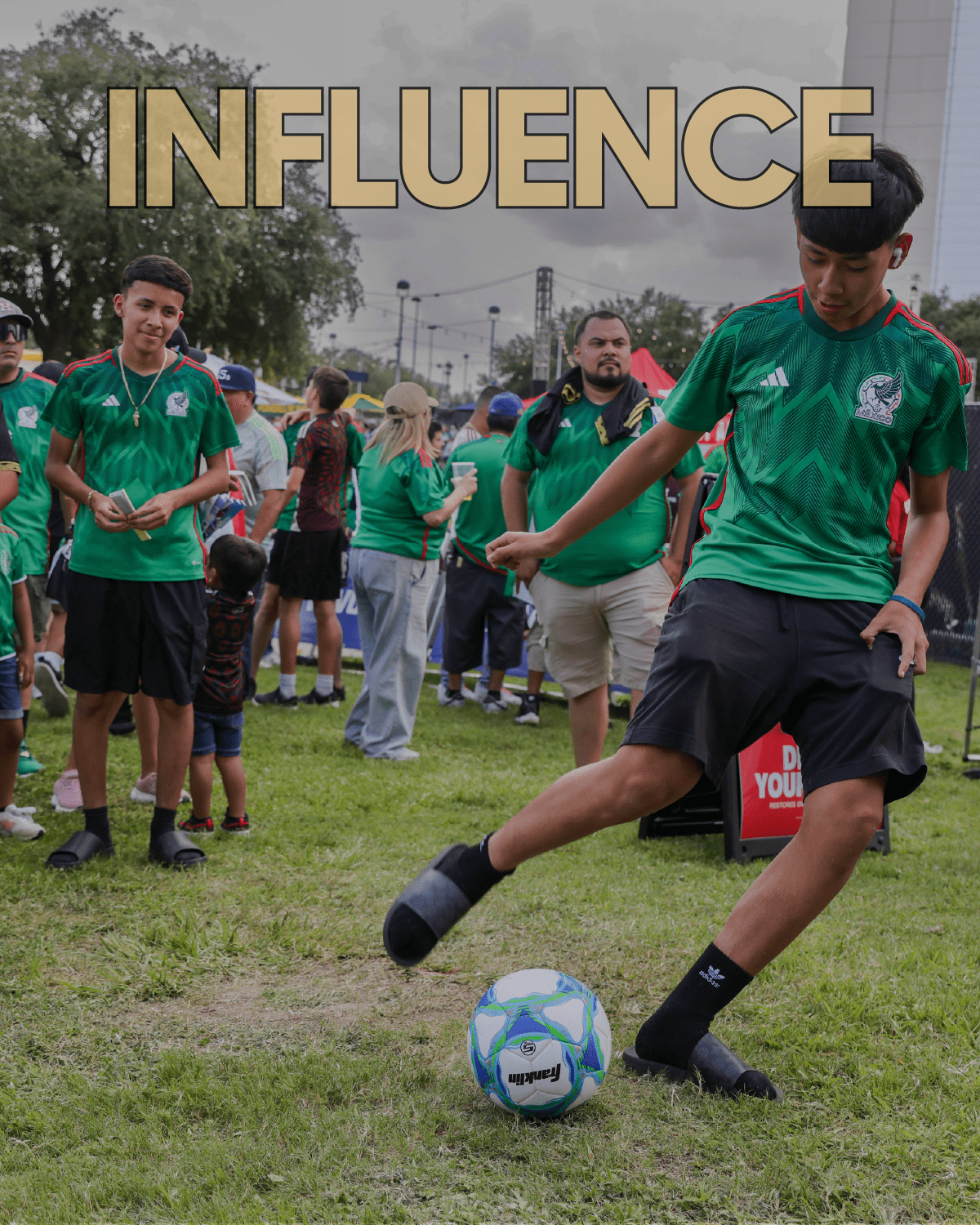 image: Mexico fan kicking a football in the fan zone