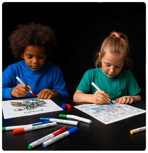 image: A boy and girl coloring with markers 