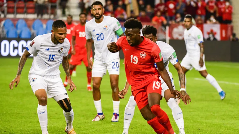 image: md6-eric-davis-alphonso-davies